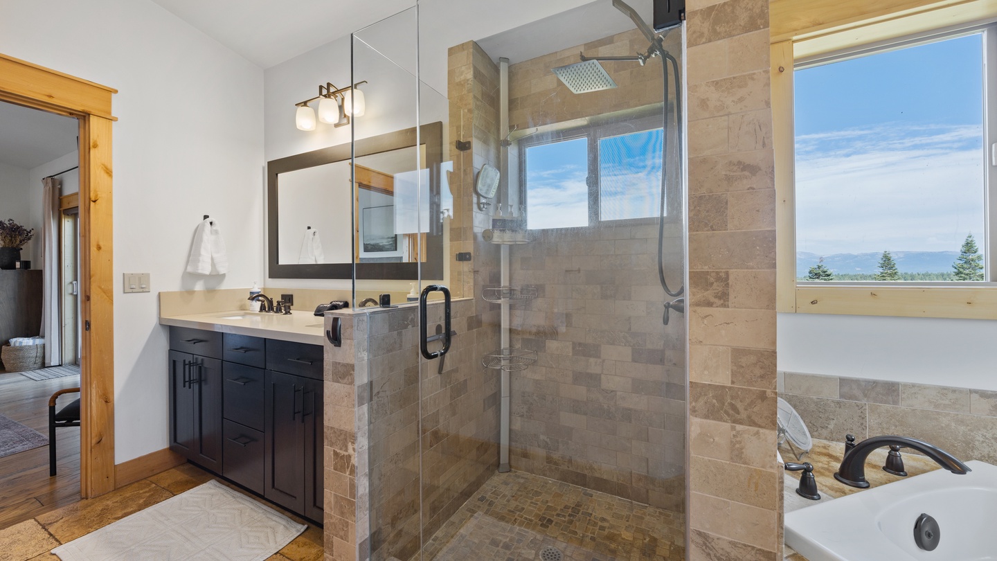 Refresh after a day's adventure in your spa-inspired bathroom, where the oversized walk-in shower and soaking tub set the stage for total relaxation.