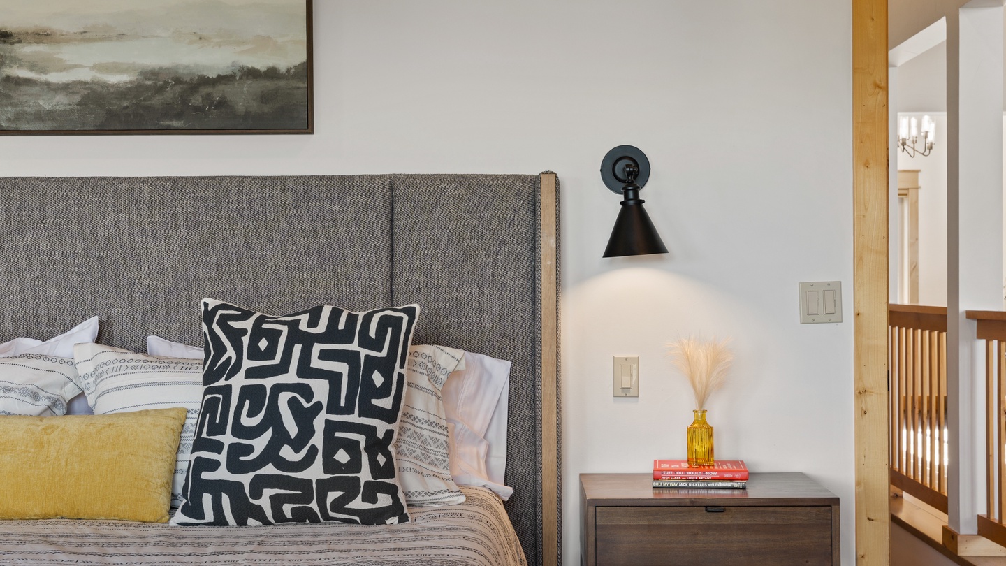 Sink into your plush upholstered bed after a day of adventure. Thoughtful touches like modern wall sconces and layered textiles create a calming retreat you'll love coming home to.