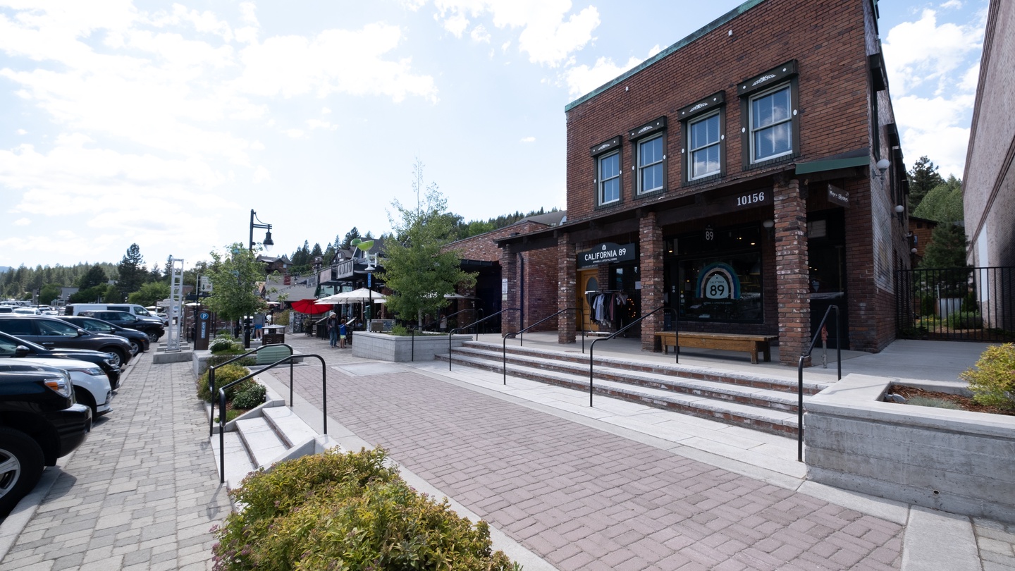 Charming brick buildings and walkable streets create a welcoming neighborhood atmosphere just steps from your accommodation.