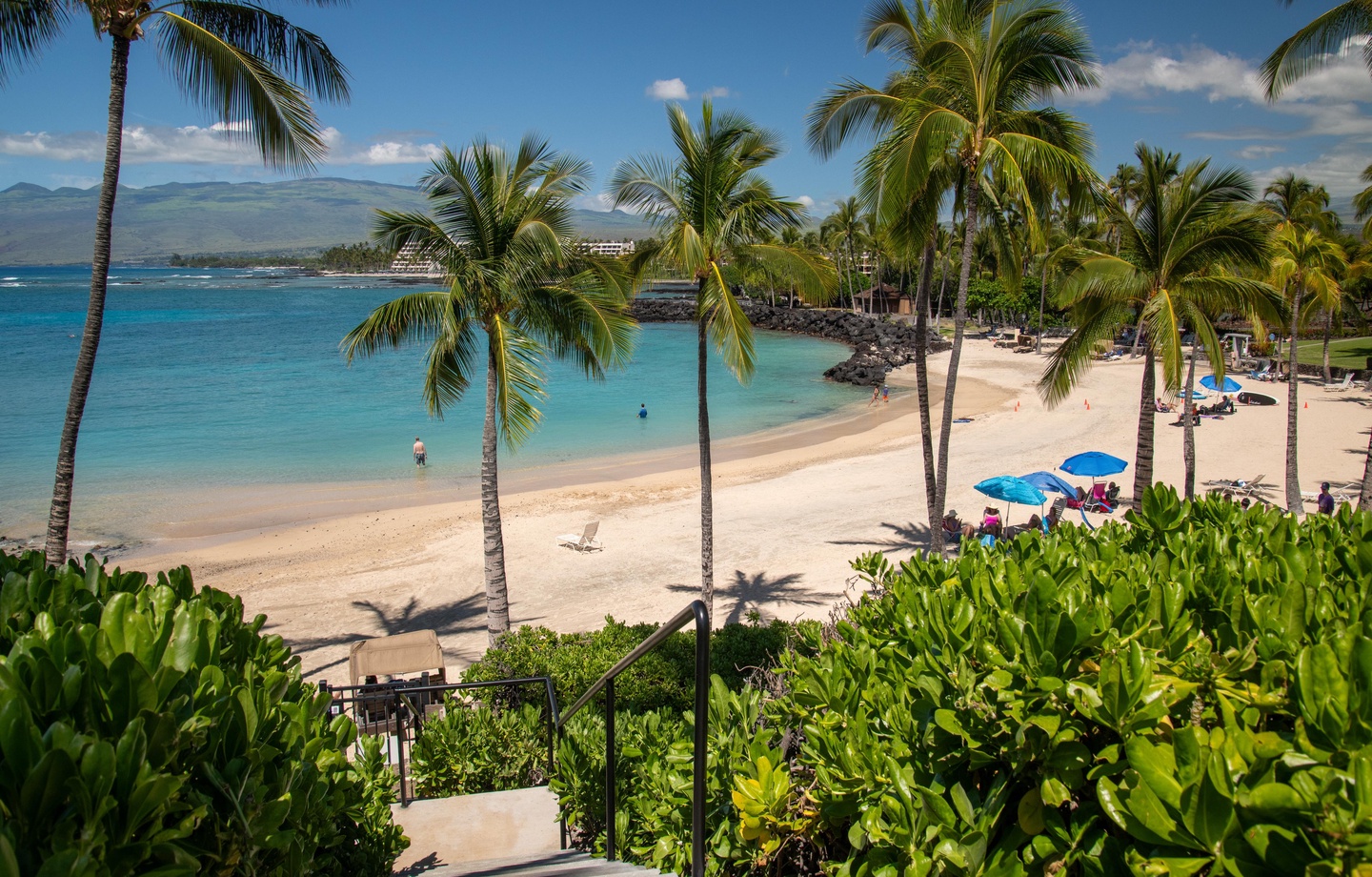 Steps down to Mauna Lani Beach Club from this home