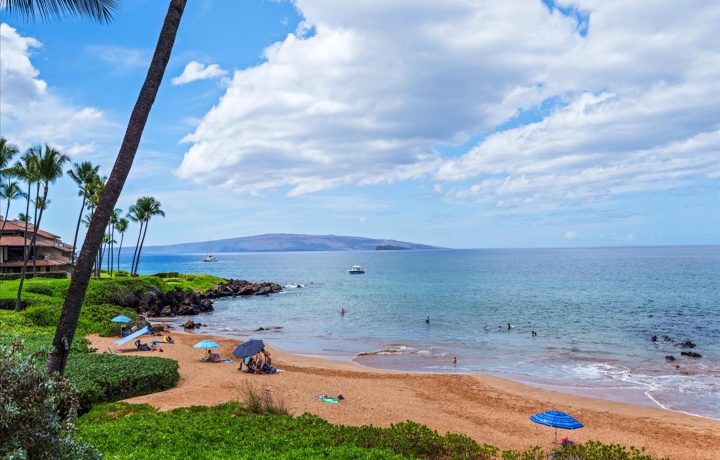 Direct Beach Access: A short, easy stroll through the lush grounds puts you right on the pristine sands of Po'olenalena Beach.