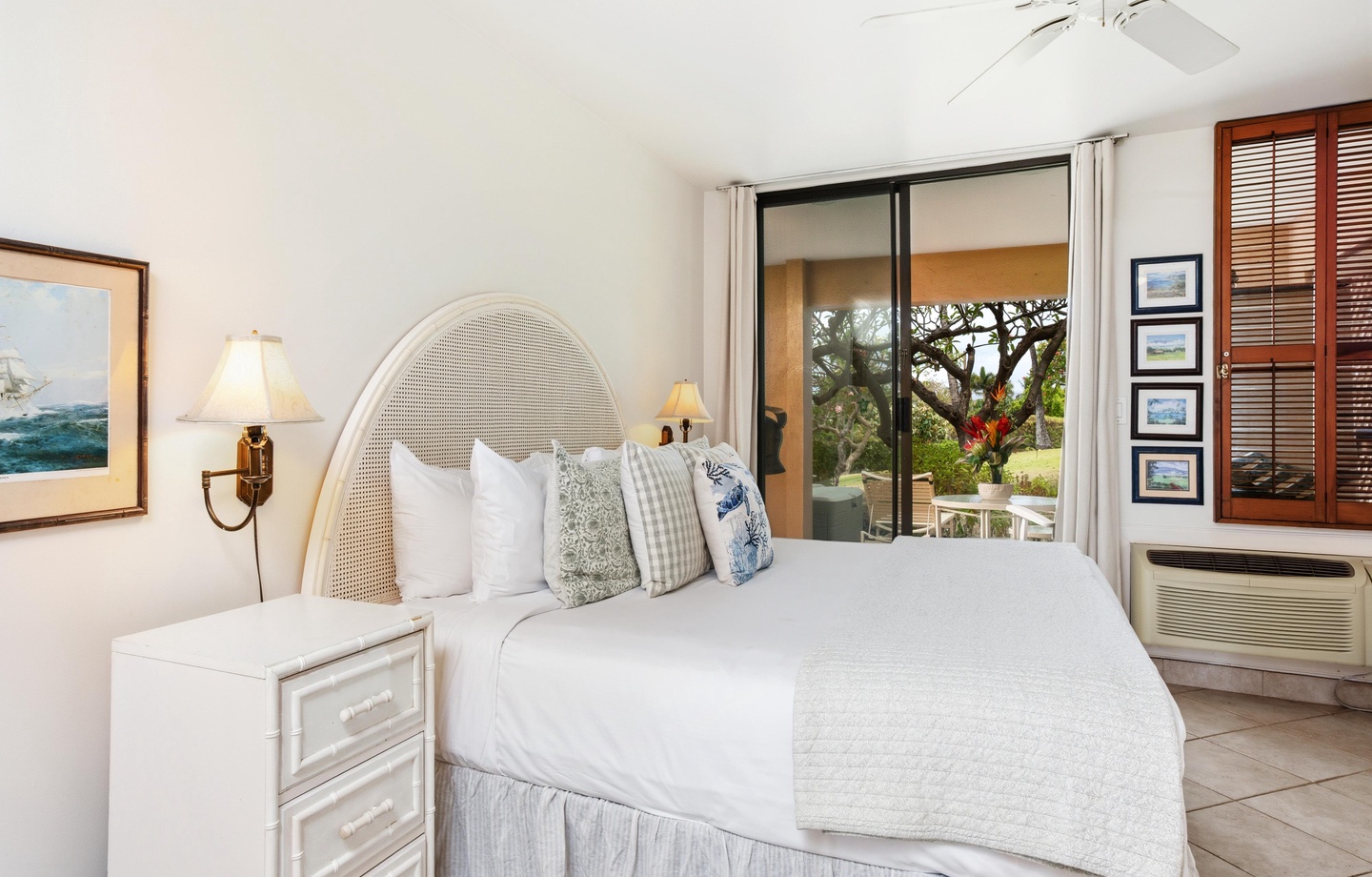 Wake up to garden views and coastal breezes in your serene bedroom retreat. Crisp white linens and tasteful décor create a peaceful sanctuary where you'll drift off to island dreams.