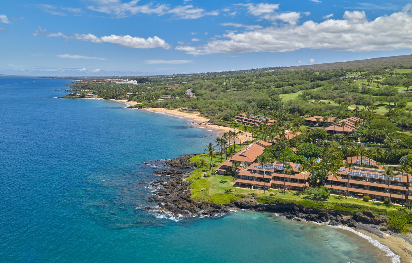 On-site resort perks feature 2 heated pools, hot tubs, and tennis courts across 10 acres of lush tropical grounds tucked in the quiet part of Wailea.