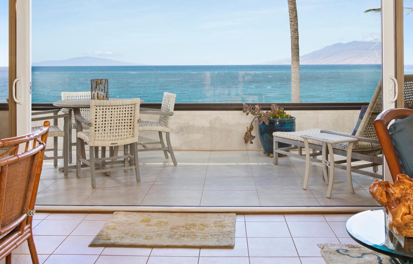 Perched on the top floor, this 1,038 sq.ft. 2-bedroom oceanfront sanctuary features vaulted ceilings, a 251 sq.ft. lanai, and panoramic ocean views where spinner dolphins play alongside whales.