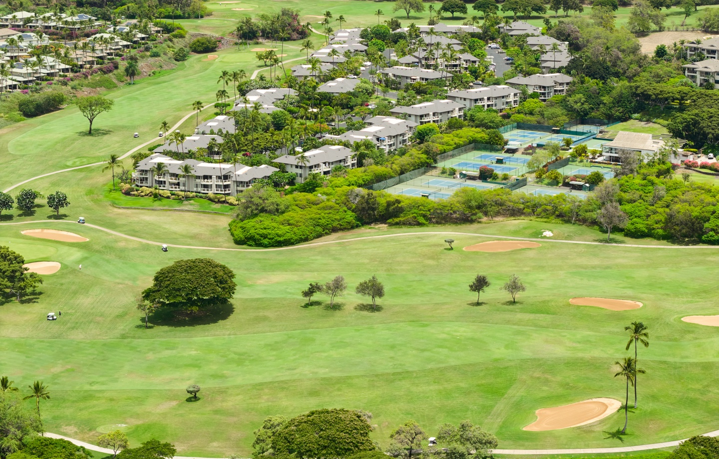 Wailea Grand Champions is an 11-acre country club-style resort set along the Wailea Blue Golf Course and Wailea Tennis Club