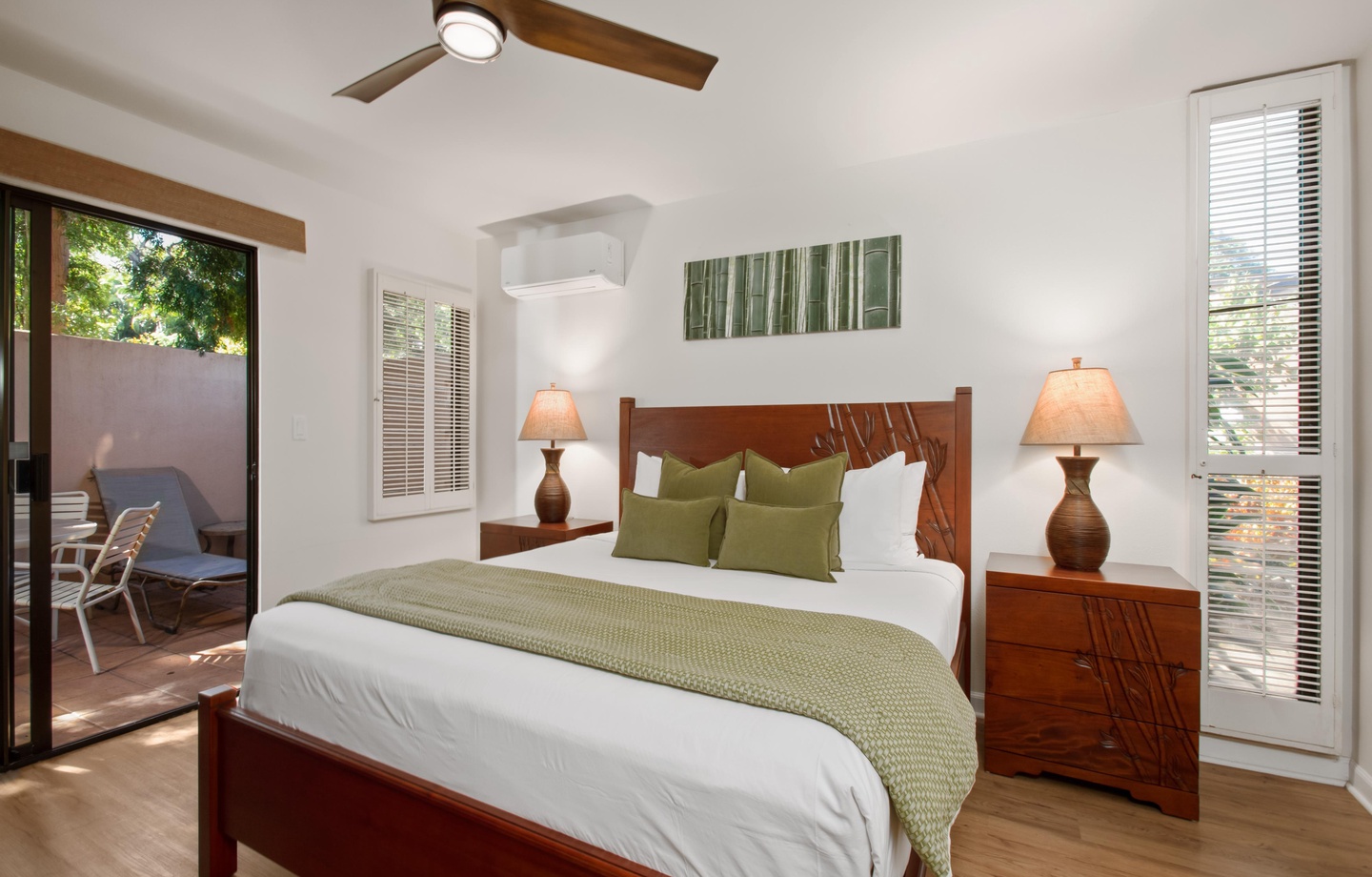 Wake up refreshed in your serene bedroom, where crisp linens, natural light, and a private patio create the perfect retreat for relaxation and rest.