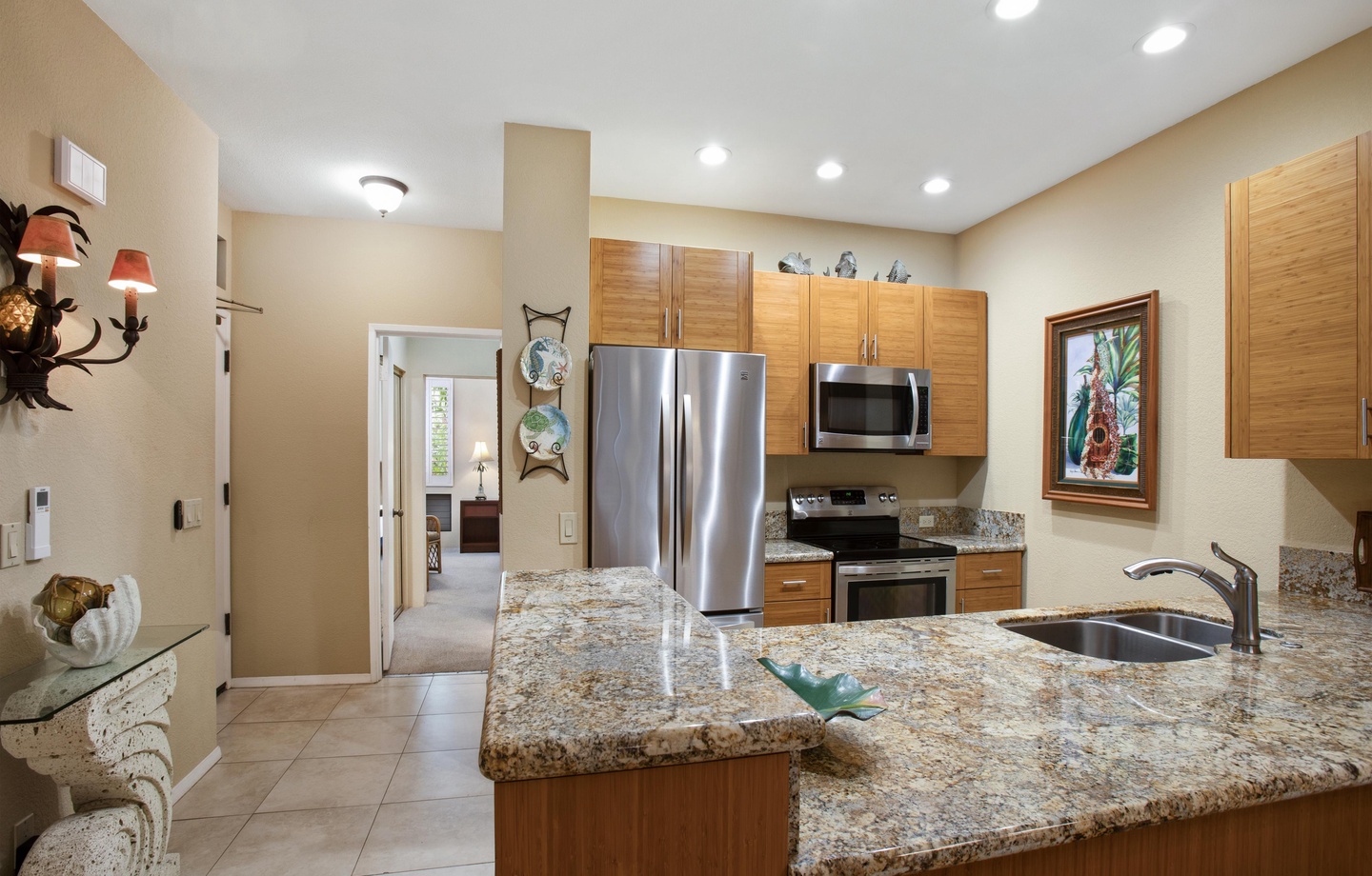 Picture yourself preparing meals on these gorgeous granite countertops, with modern stainless appliances and plenty of space to gather. The open layout invites you to cook, share stories, and create vacation memories together.