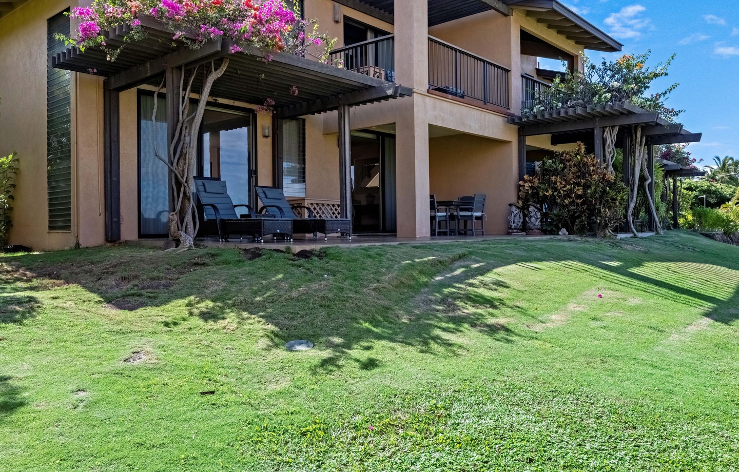 split-level 1-bedroom, 1.5-bathroom condo sleeping up to 4, with ocean and pool views from the patio — ideal for couples and small families.