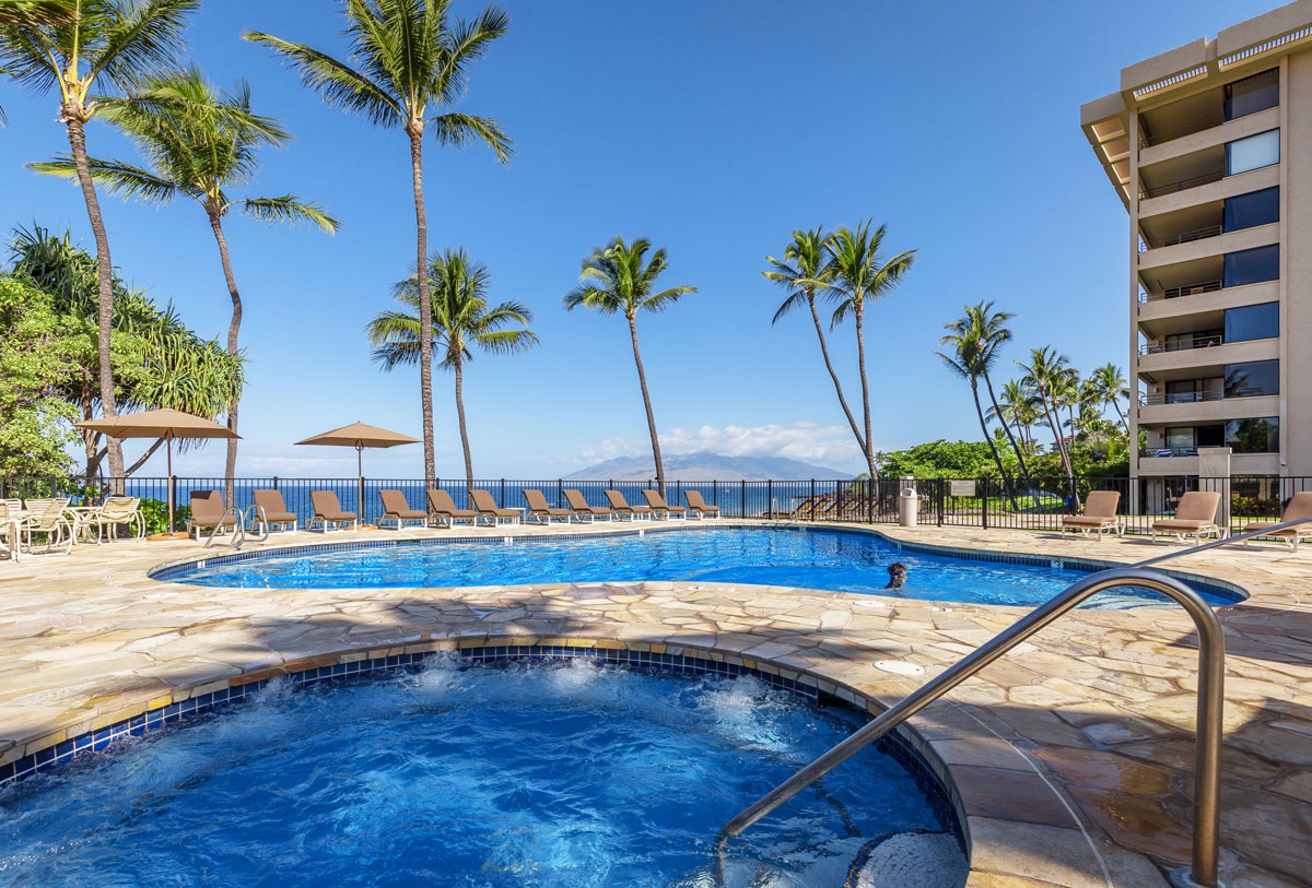 Below, oceanfront resort amenities await—from the sparkling pool and soothing hot tub nestled by the beach next to the scenic Wailea Coastal Walk, connecting you to world-class resort dining and shopping.