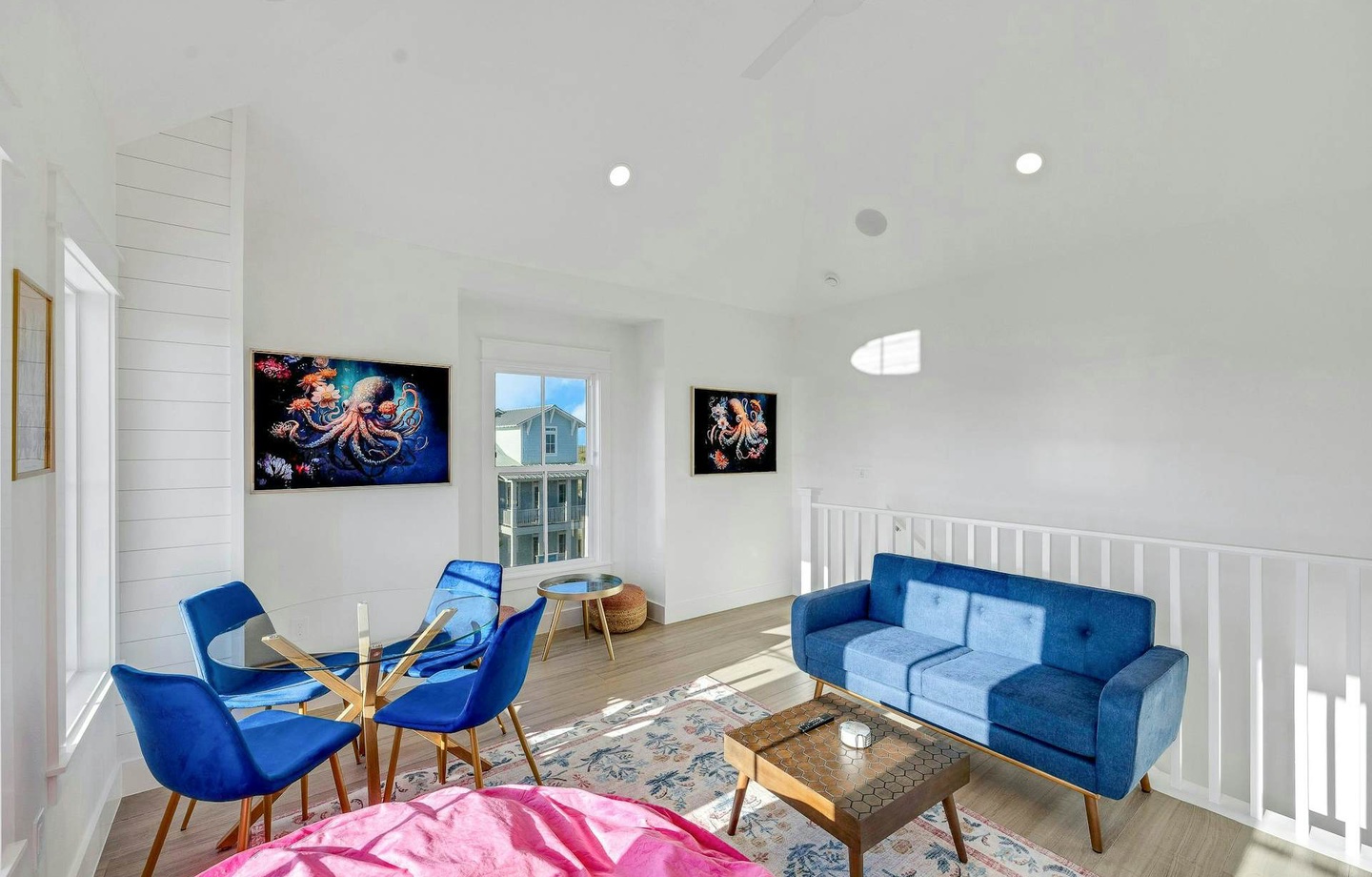 Unwind in your bright, airy loft lounge with soaring ceilings, coastal-inspired décor, and mid-century furnishings that invite relaxed conversation after a day of adventure.