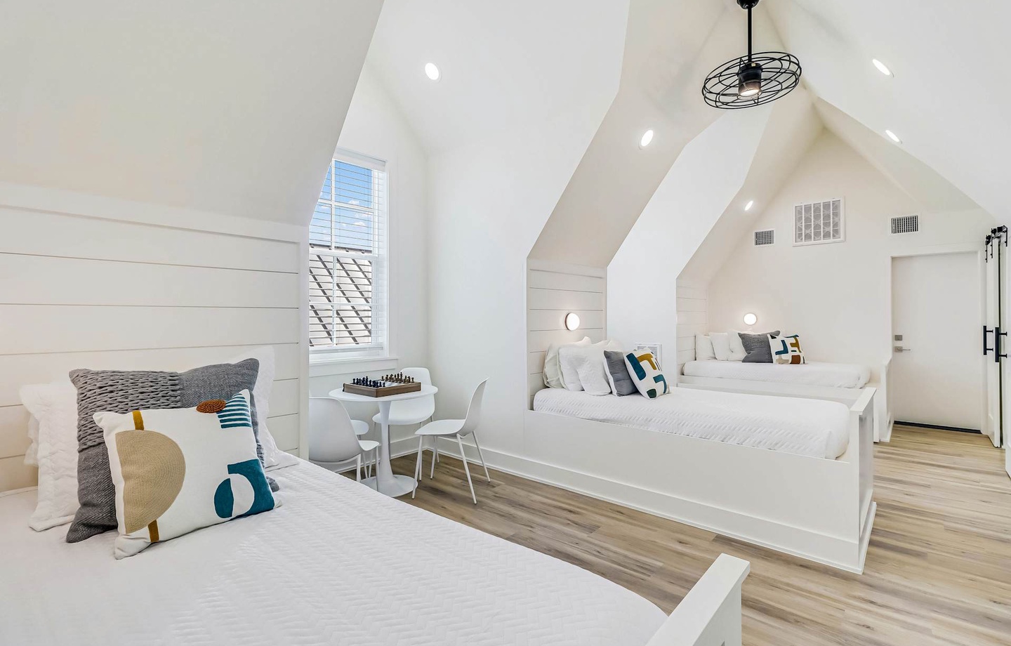 Your bright, airy retreat features three comfortable beds perfect for the whole family, with charming vaulted ceilings and a cozy chess nook by the window.