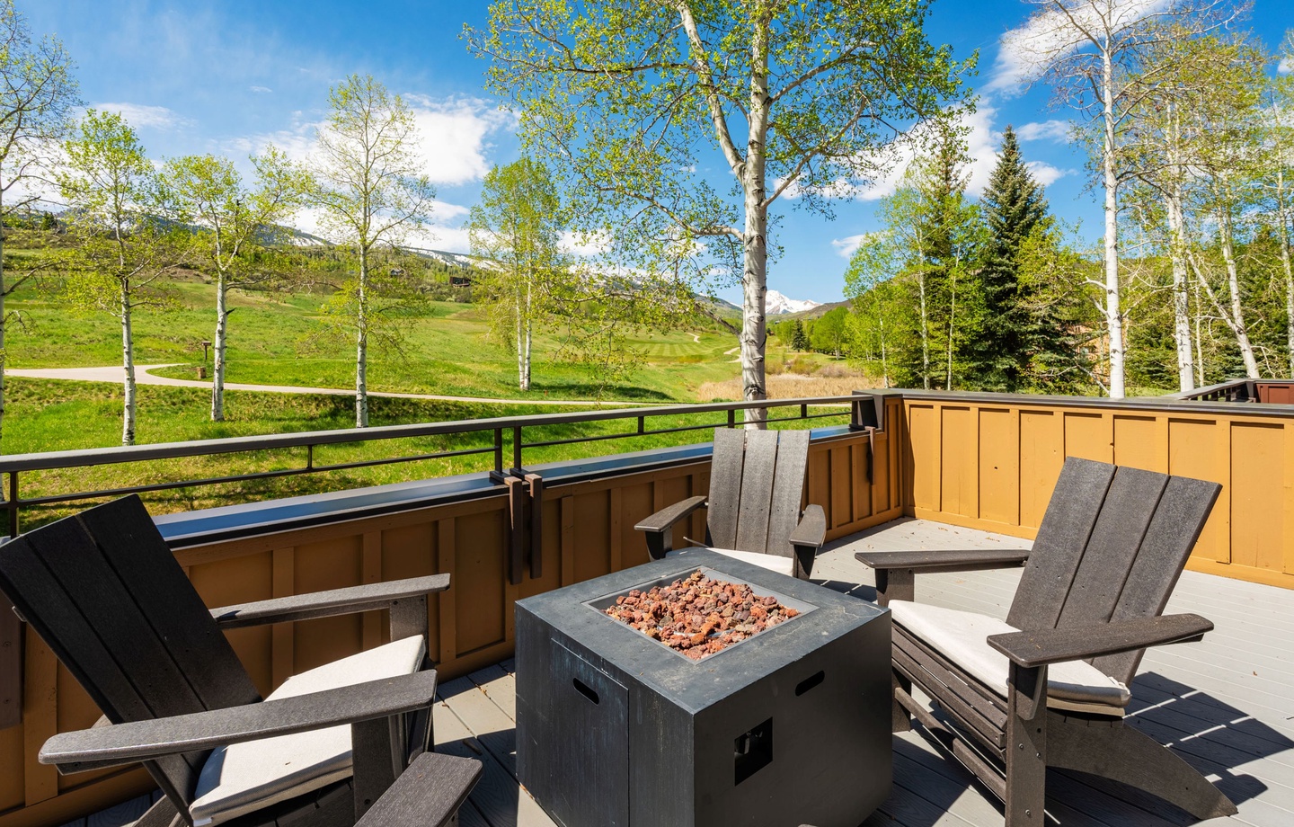 Gather around the fire pit on your private deck and soak in sweeping mountain and meadow views framed by aspens and evergreens—perfect for peaceful mornings or evenings under the stars.