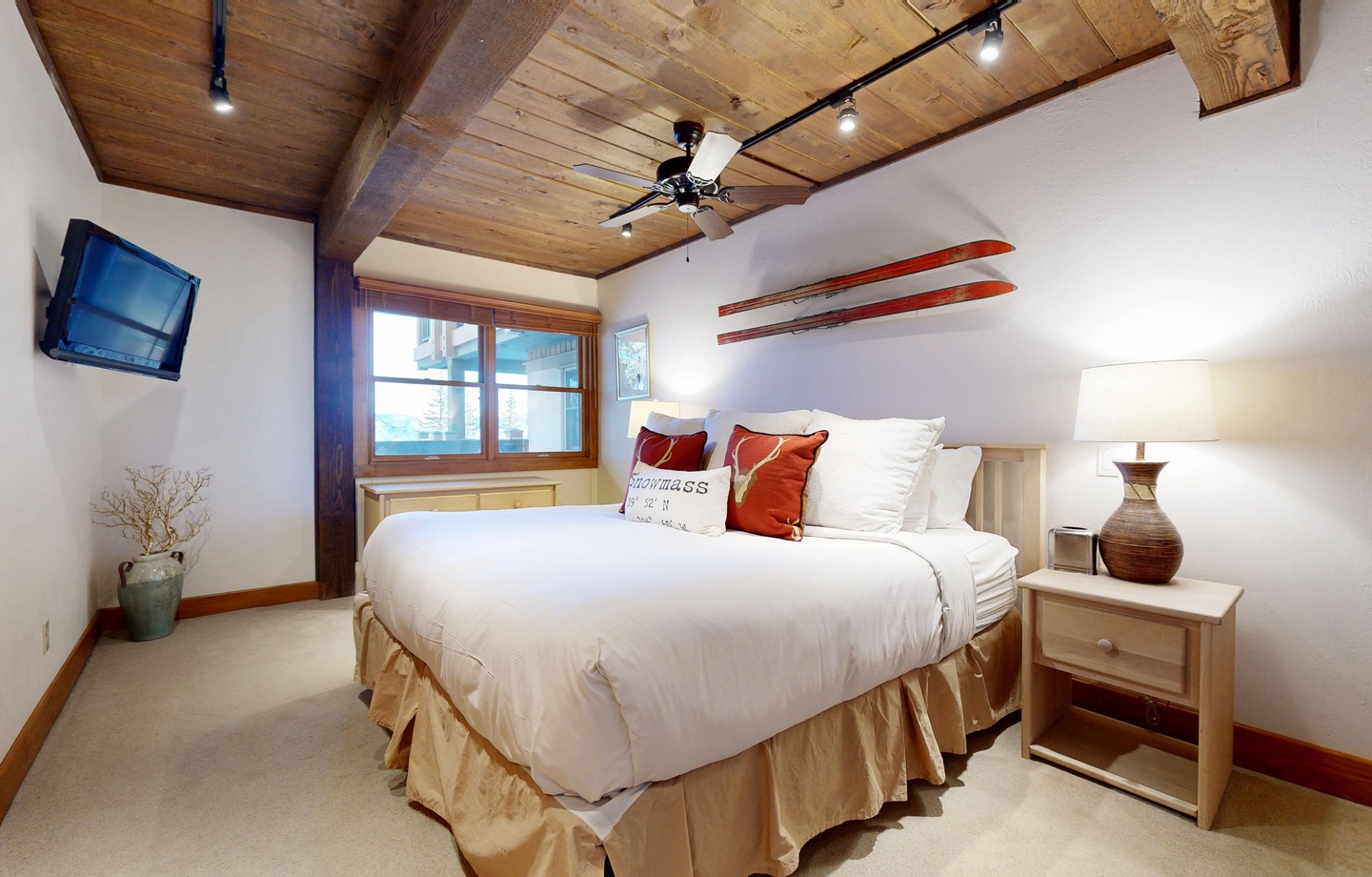 Drift off to sleep under your exposed beam ceiling with rustic charm and modern comfort perfectly blended together.