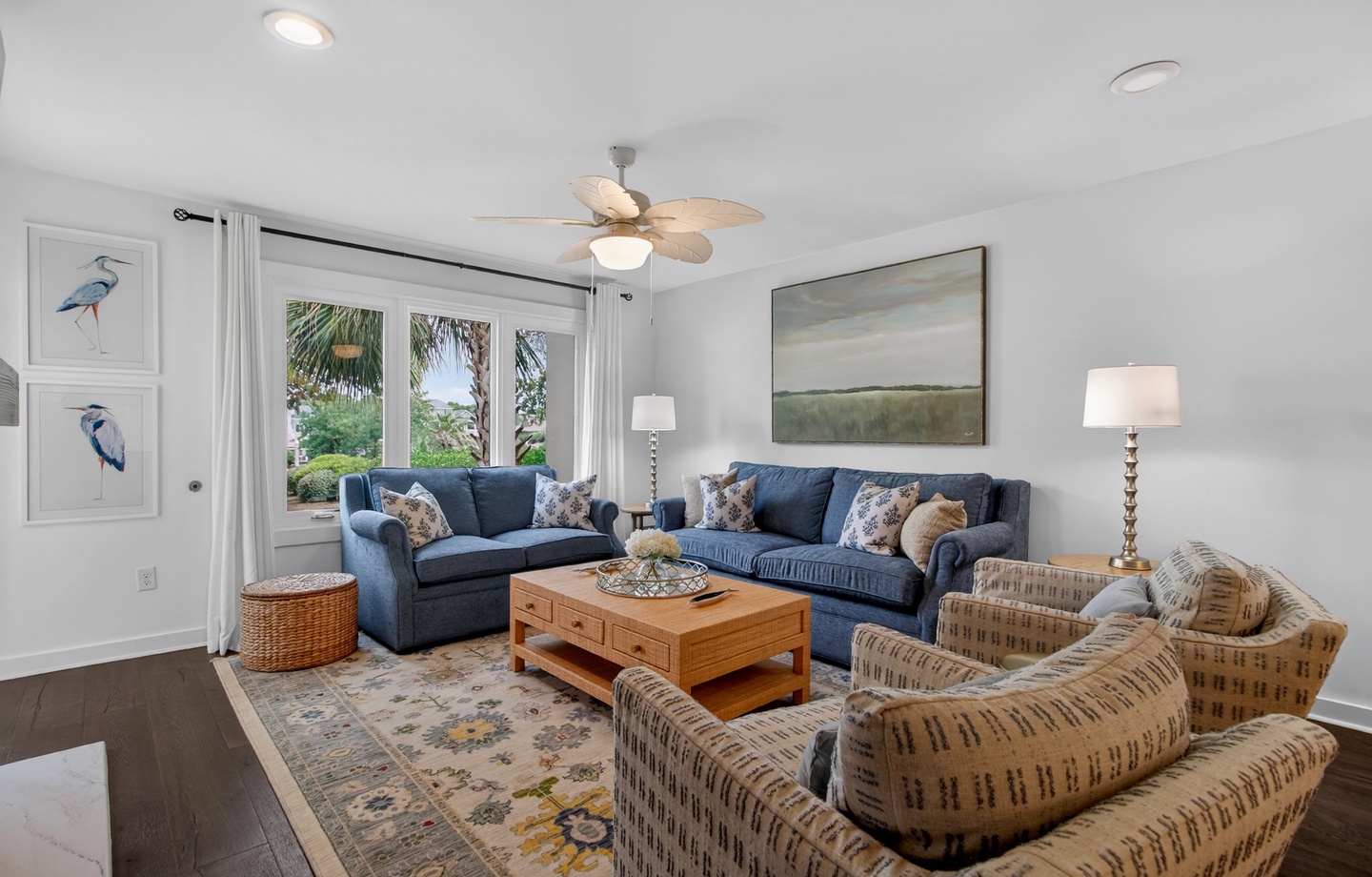 Sink into plush seating where coastal breezes meet elegant comfort. Your peaceful retreat features stylish furnishings, tropical views, and a soothing color palette perfect for unwinding after island adventures.