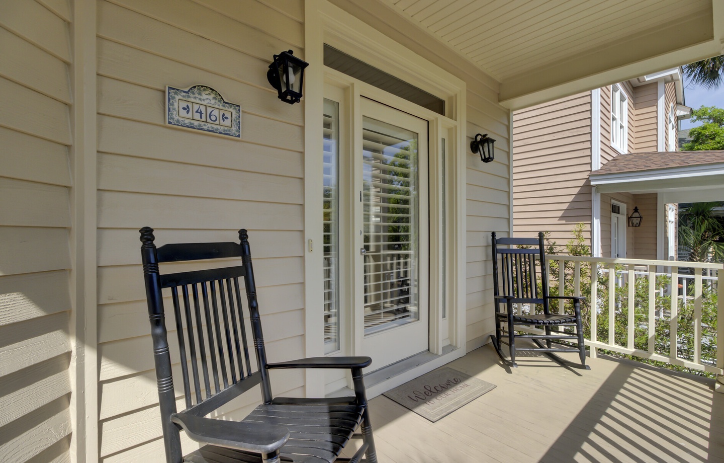 Settle into your charming front porch with classic rocking chairs, where you can sip morning coffee and watch the world go by.