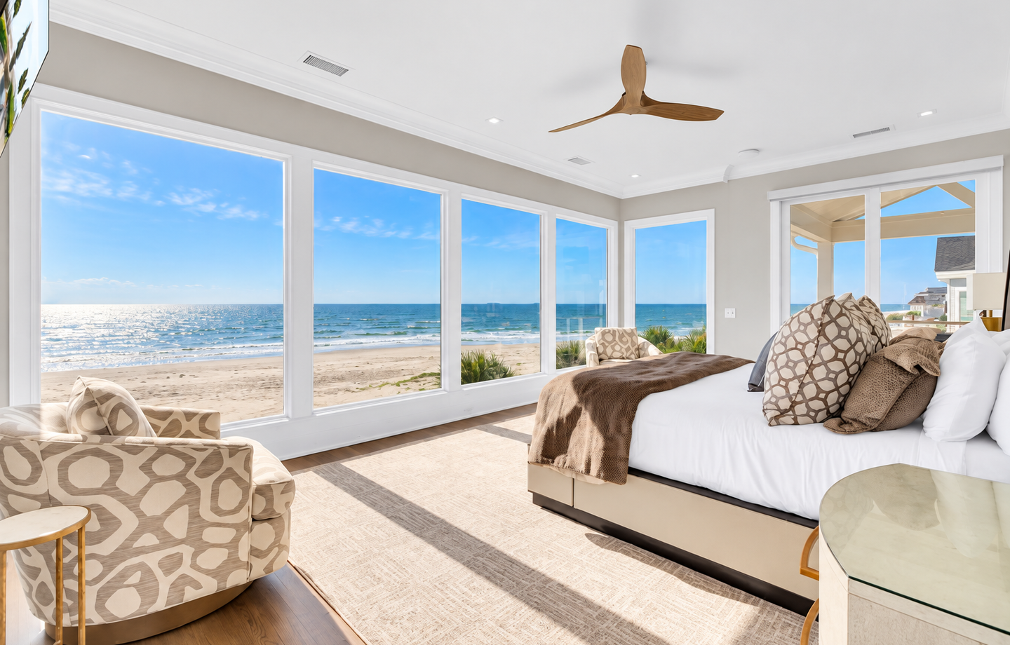 Wake up to endless ocean views framing your bed, with waves rolling in right outside your window and the soft glow of daylight filling your coastal retreat.