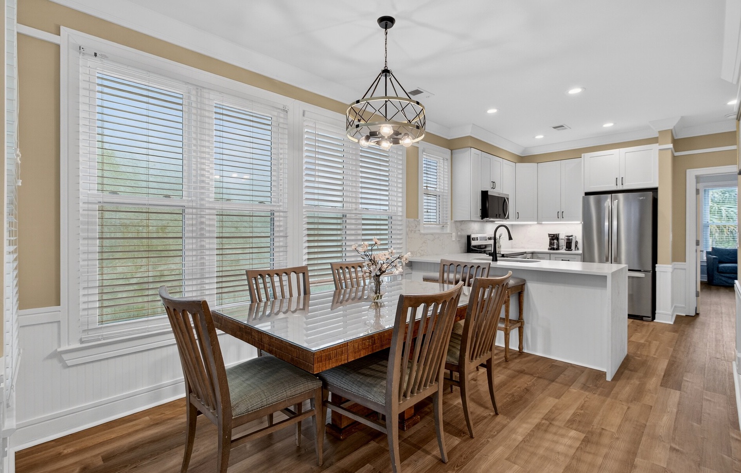 Your bright, modern kitchen flows seamlessly into the dining area, where you'll love hosting meals around the spacious table.