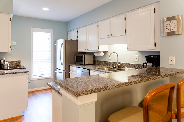 - Bright, modern kitchen with everything you need to feel right at home - Prep meals with ease on gleaming granite countertops and updated appliances - Grab a stool at the bar and enjoy breakfast, coffee, or a wine break while chatting