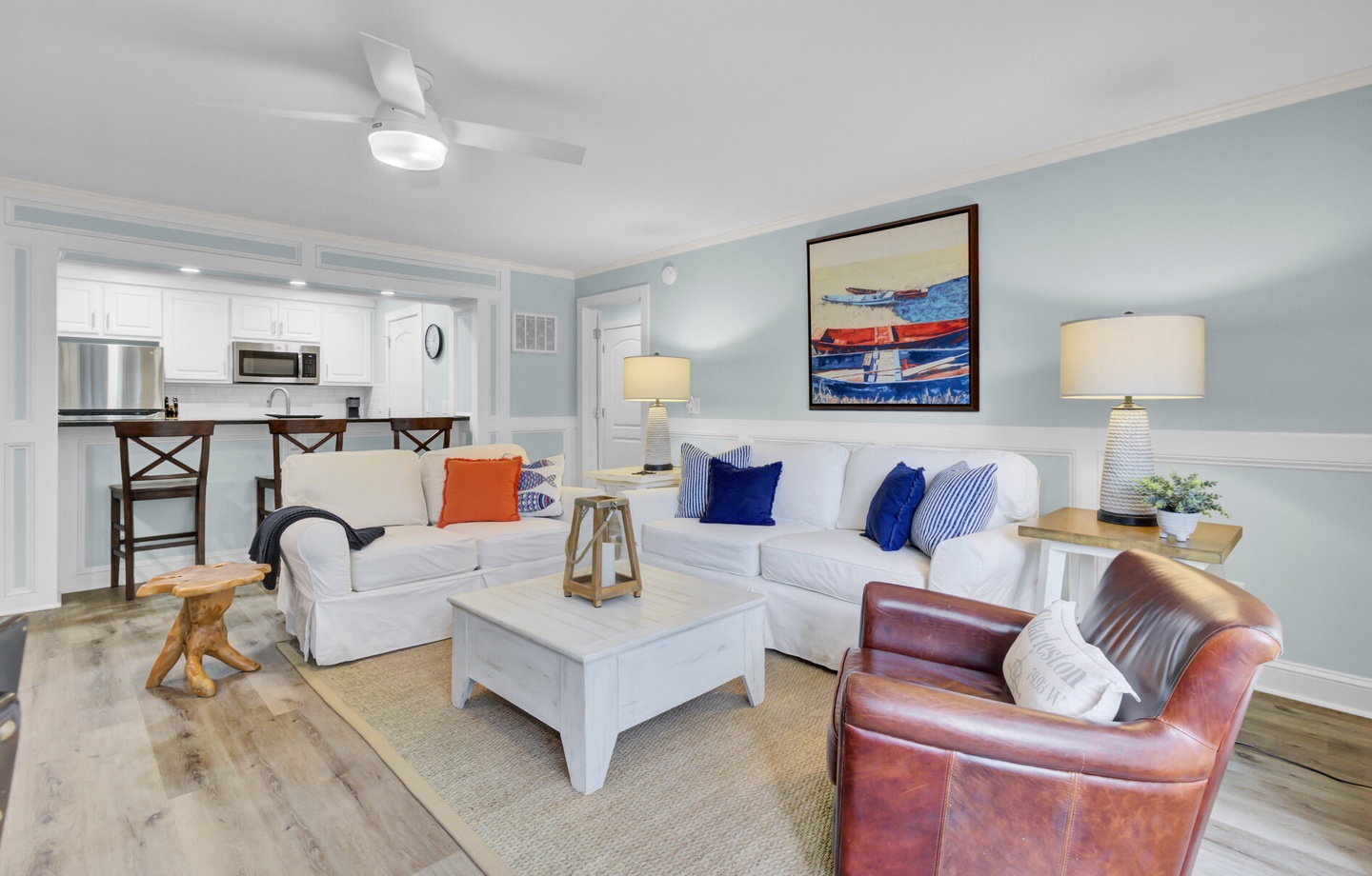 Sink into plush coastal comfort with nautical touches and open-concept flow to your fully equipped kitchen.