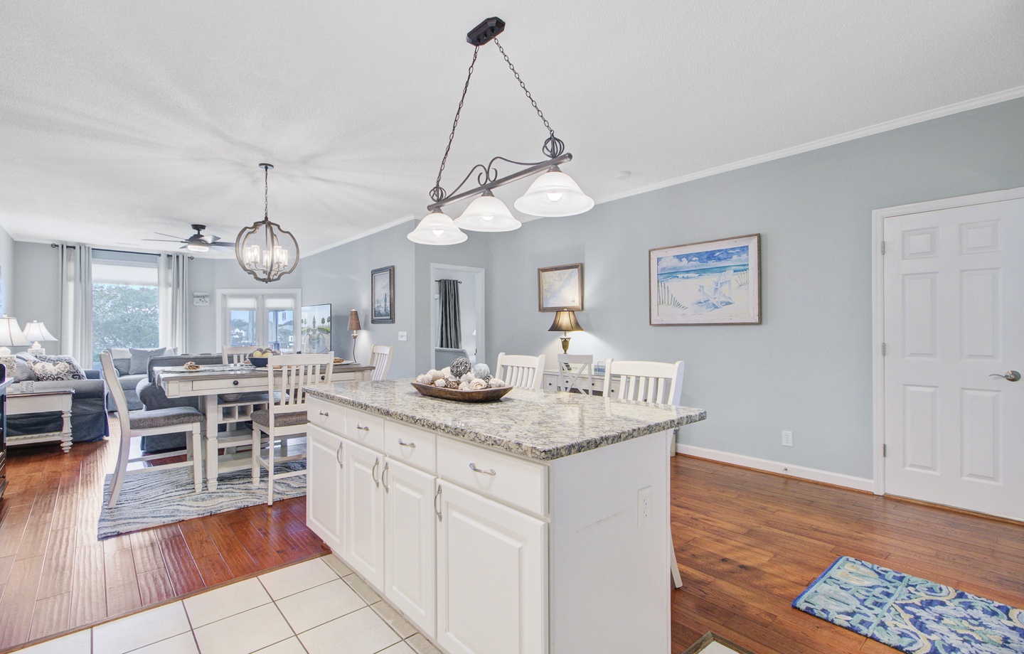 Your open-concept kitchen flows seamlessly into the dining area, perfect for preparing meals while staying connected with family and friends.