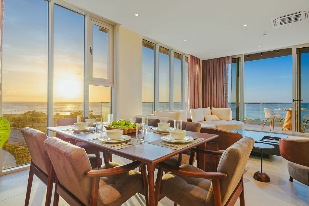 Dine with breathtaking sea views in your elegant modern space, where floor-to-ceiling windows frame spectacular sunsets.