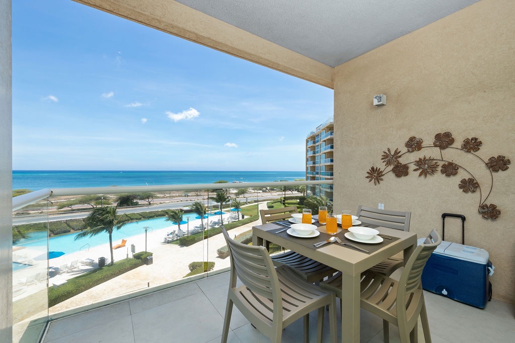 Balcony w/ tabe and chairs