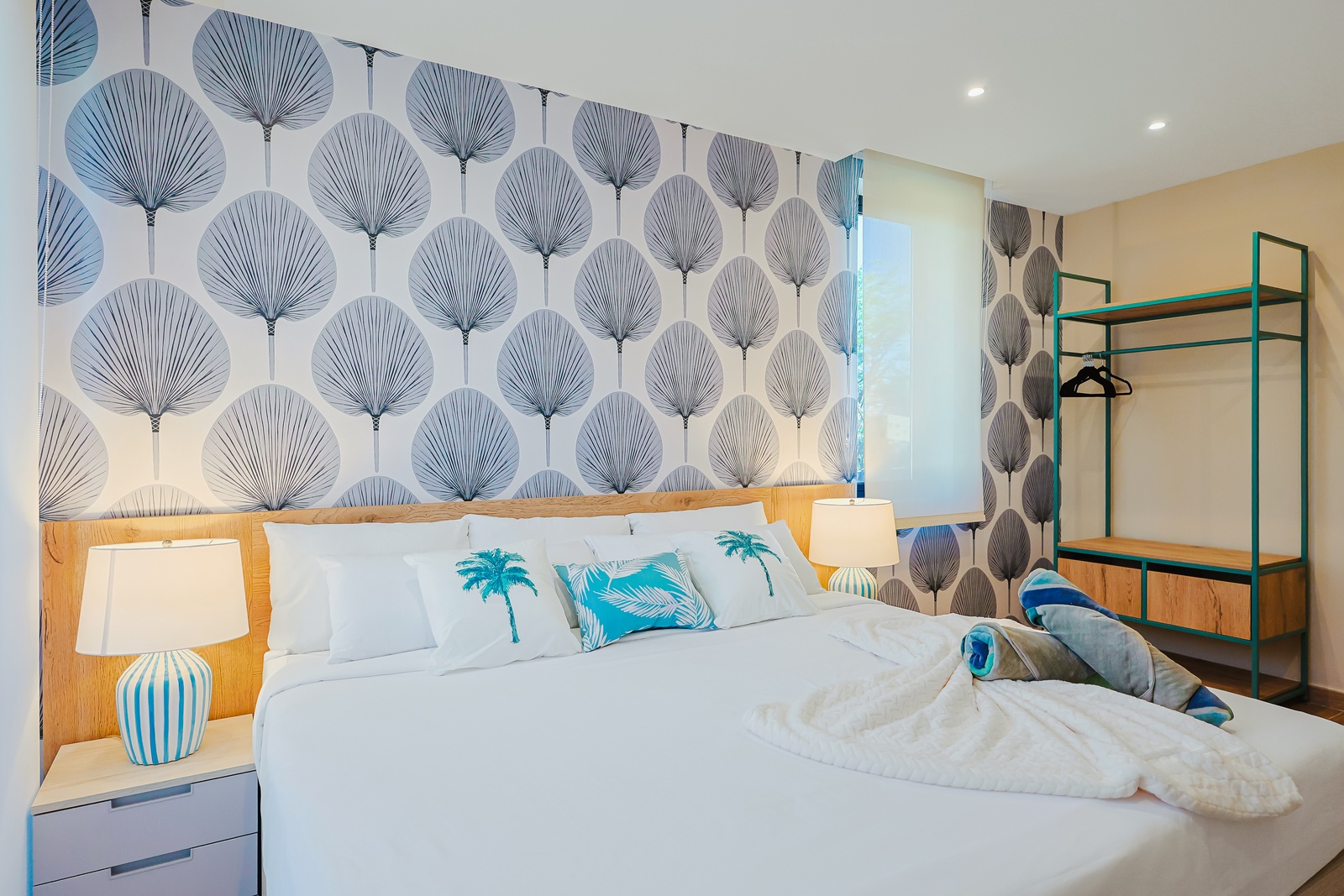 Unwind in your serene coastal-themed bedroom, where crisp linens and beachy accents invite relaxation after a day of adventure.