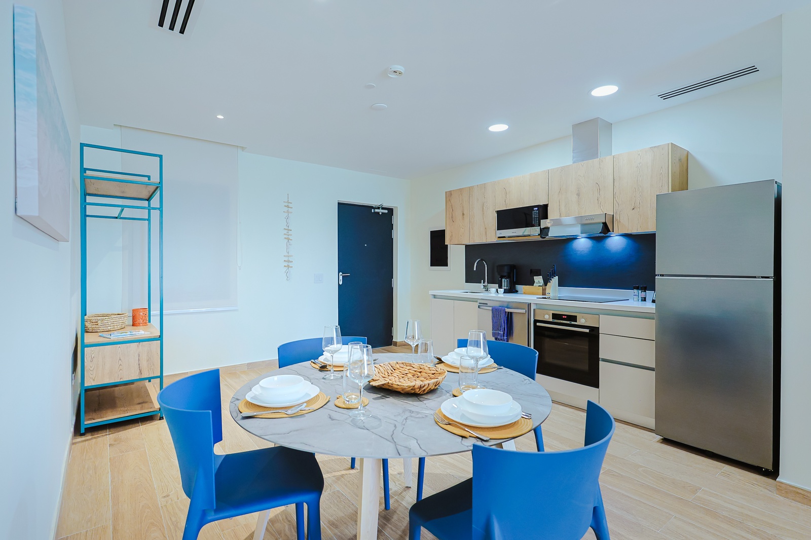 Enjoy meals together in this bright, modern kitchen and dining space with stylish touches and everything you need to cook and dine comfortably.