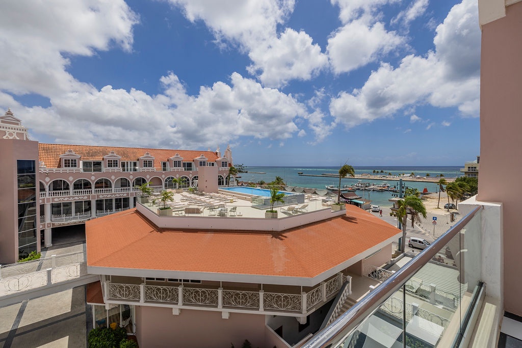 The property is located in a vibrant coastal area with pool view, near by marina. The surrounding neighborhood offers easy access to waterfront activities and local attractions.