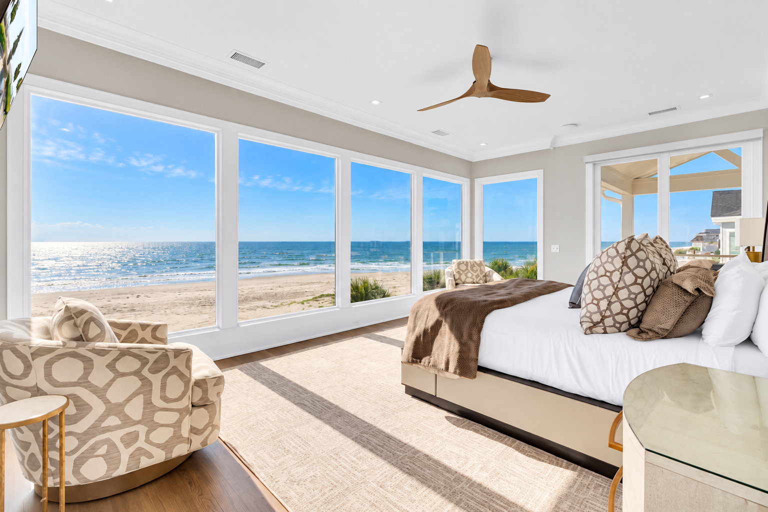 Wake up to endless ocean views framing your bed, with waves rolling in right outside your window and the soft glow of daylight filling your coastal retreat.