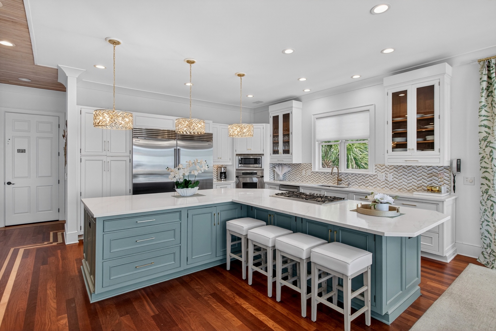 Your dream kitchen awaits with gleaming countertops, premium appliances, and a welcoming island perfect for morning coffee or evening meals.