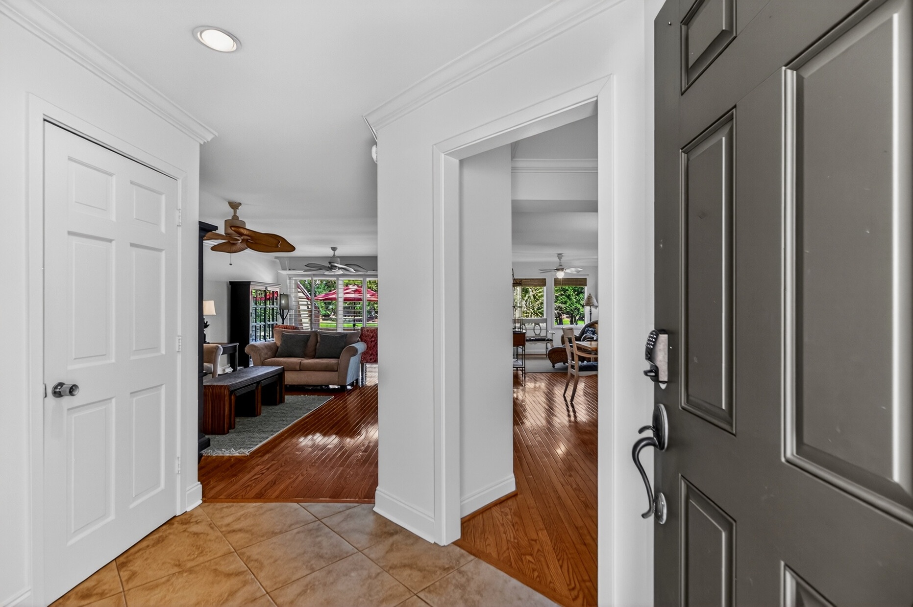 Step inside this bright, welcoming entryway with warm hardwood floors and views into the spacious living areas—your perfect starting point for a relaxing getaway.