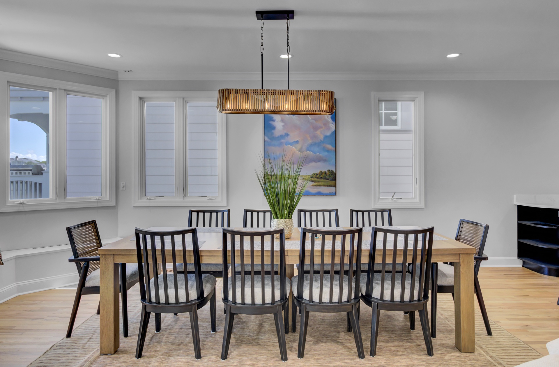 Gather around this elegant dining table where memorable meals and conversations await your group.
