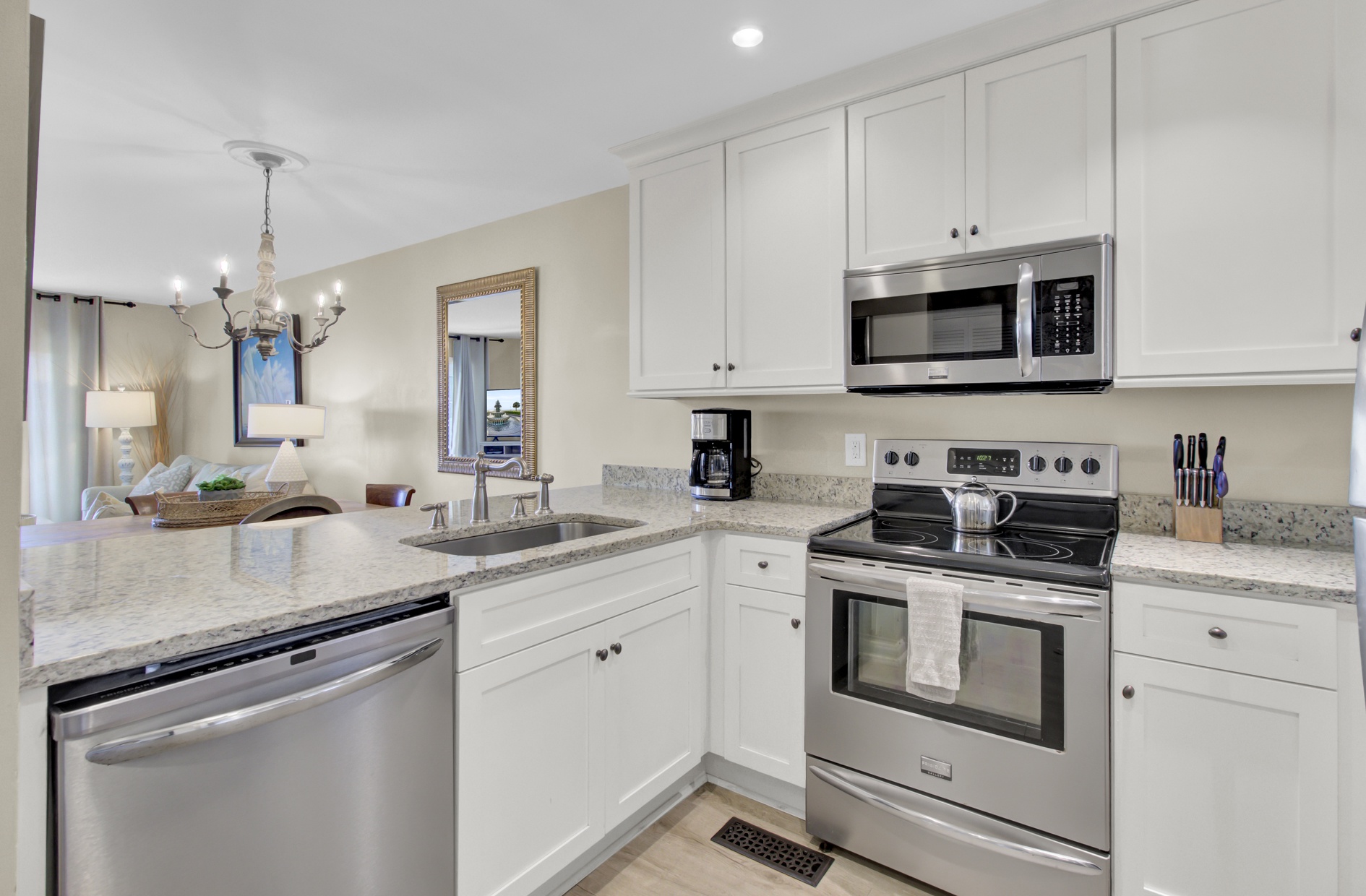 Your fully equipped kitchen features granite countertops, stainless steel appliances, and everything needed for home-cooked meals during your stay.