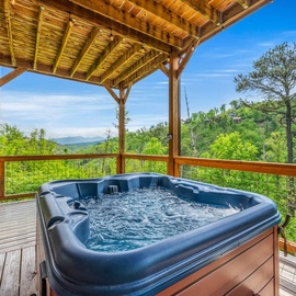 Rustic Retreat's bubbling hot tub