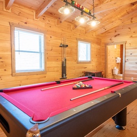 Cabin In The Mountains' pool table and arcade room