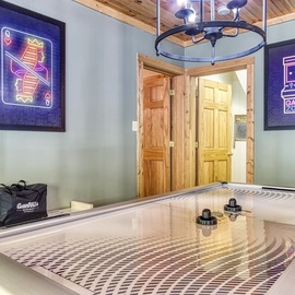 Cades Cove Escape's air hockey table