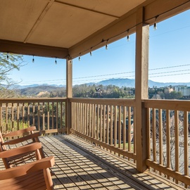 Relax on your private covered balcony with rocking chairs and breathtaking mountain views stretching to the horizon.
