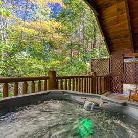 Cozy Bear Lodge's bubbling hot tub