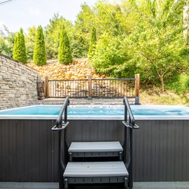 Soak away the day in your swim spa, surrounded by natural greenery and complete privacy. The perfect outdoor retreat for unwinding after adventure.