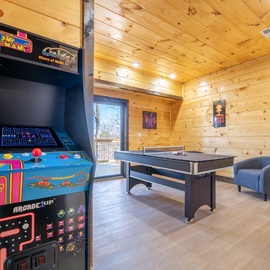 Your personal game room awaits with vintage arcade games and table tennis for endless fun.