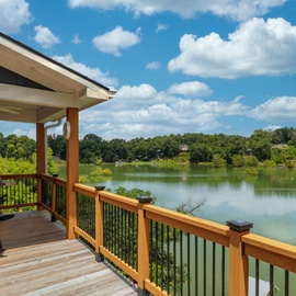 Sip your morning coffee on the covered deck and soak in the peaceful lakefront setting—your own private retreat with serene water views, fresh air, and a grill ready for sunset dinners.