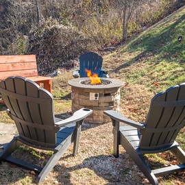 Gather around the crackling fire pit for cozy evenings under the stars, with comfortable seating perfect for roasting marshmallows.