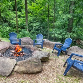 Timber Tails' firepit and grill area