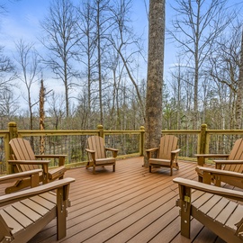 Neverland's spacious deck with outdoor seating