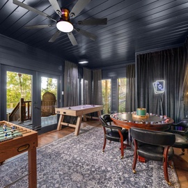 Challenge friends to foosball or poker in your private game room, where dark wood paneling and a ceiling fan keep things cool during spirited matches.