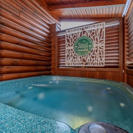 Soak away your stress in this private hot tub, surrounded by warm cedar walls and mountain charm.