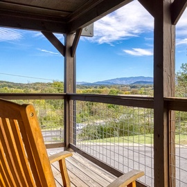Settle into your rocking chair and drink in sweeping mountain vistas stretching across the valley.
