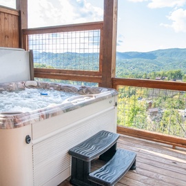 Hilltop Hideaway's bubbling hot tub