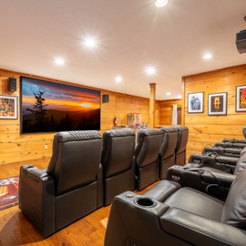 Sink into plush leather recliners in your private home theater—perfect for movie marathons and game nights after exploring the mountains.